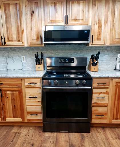 Kitchen backsplash tile — hickory cabinets